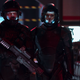 Amos and Bobbie, wearing heavy armor and carrying guns, prepare for battle in The Expanse's final season.
